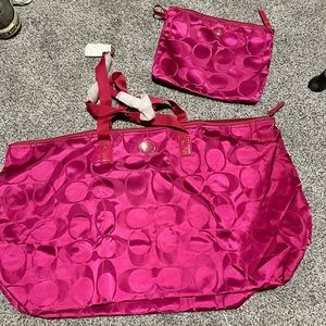 Coach duffel bag, with removable snap on travel pouch.